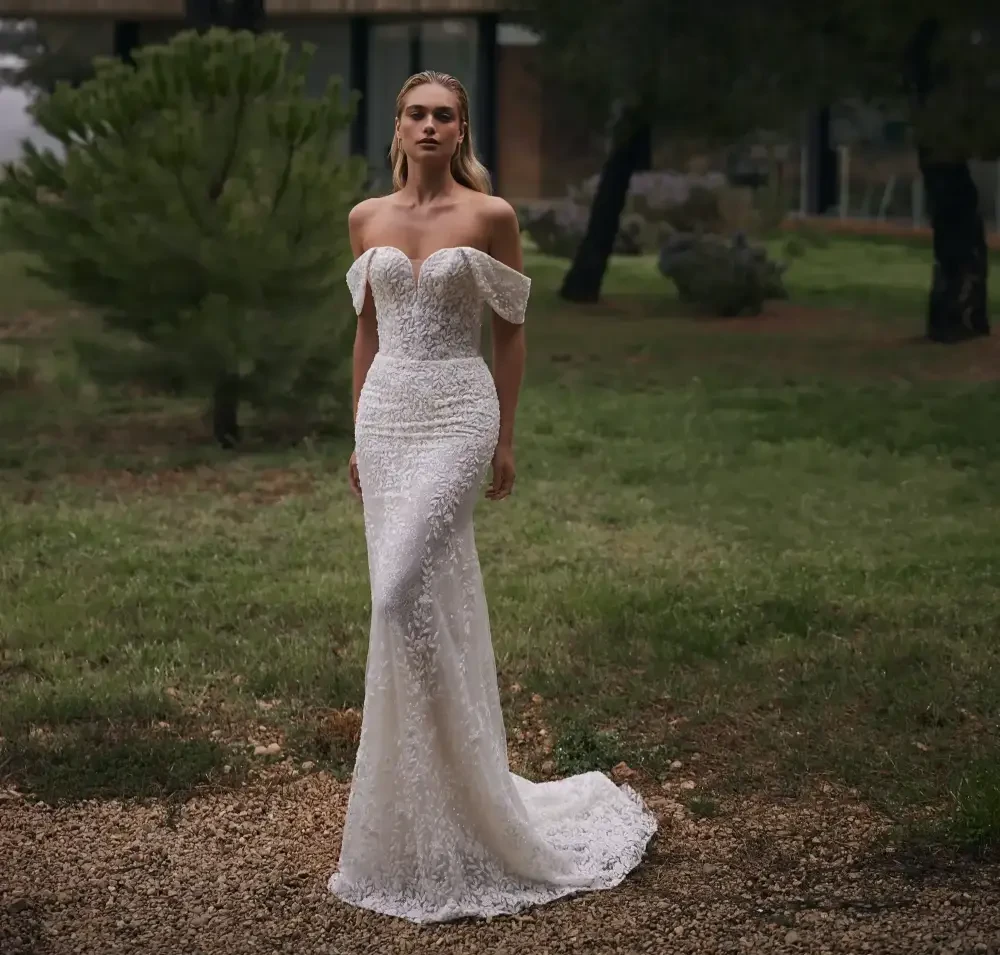 Model wearing a white gown